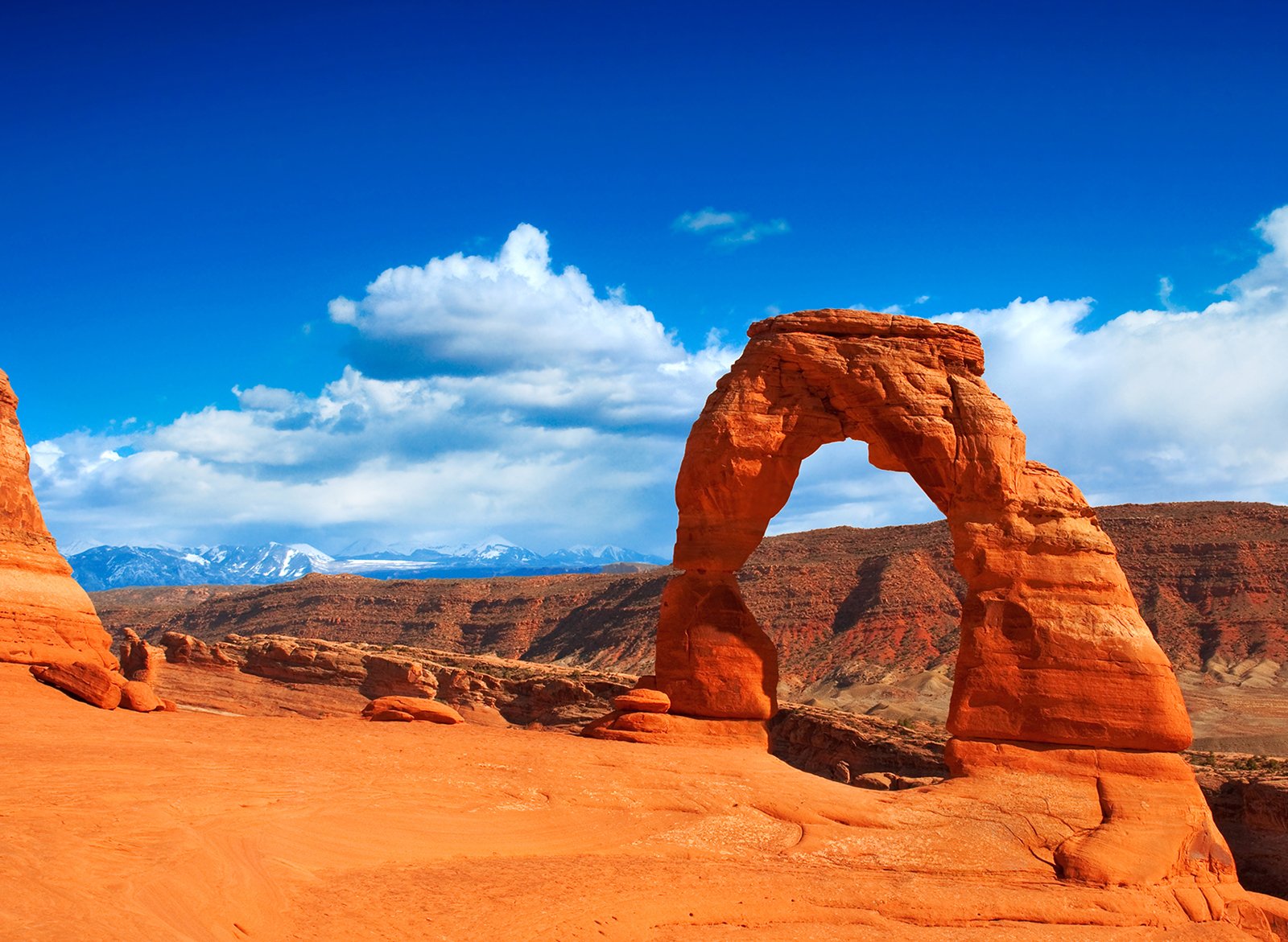 A natural sandstone arch in Utah’s red-rock country